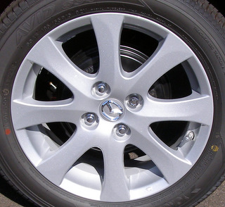 11-14 MAZDA 2 SE/TOURING AT 15x6 Carved 8 Spoke A SILVER, 5MM CAP