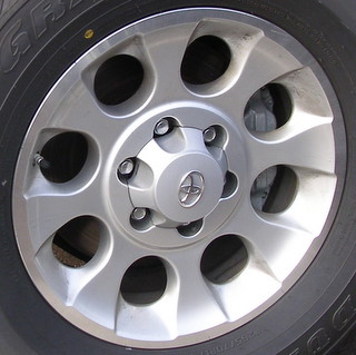 10-13 TOYOTA 4 RUNNER TRAIL 17x7.5 Dished 8 Slot, Uneven Flange SILVER, MC'D LIP EDGE