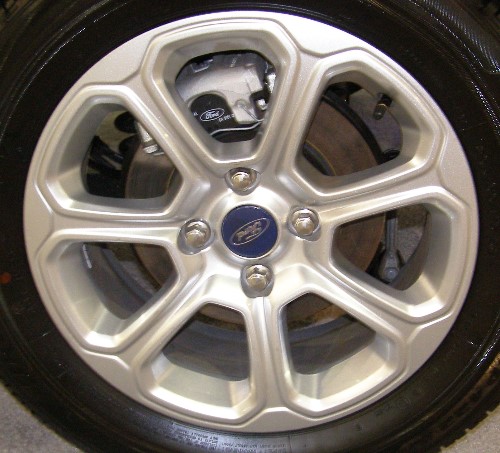 18-22 FORD ECOSPORT SE 16x6.5 Thin Grooved 7 Spk, Scalloped Lip SILVER SPARKLE