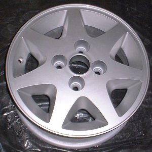 85-90 FORD TEMPO 14x6 Flat Tapered 7 Spoke SILVER
