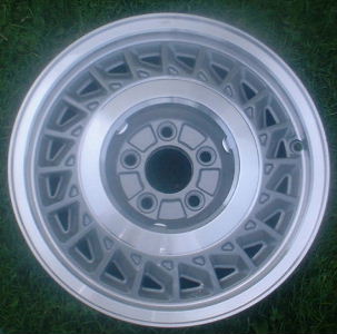 88-89 LINCOLN CONTINENTAL 15x6.5 Slanted 20 Slot w Covered Lugs MACHINE/GREY