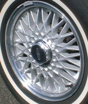 90-97 LINCOLN CONTINENTAL 15x6.5 Lacy Mesh w Covered Lugs SILVER, MC'D LIP