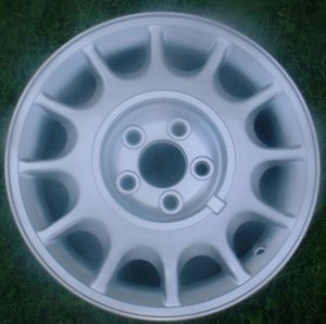 91 MERCURY SABLE 15x6 12 Slot with Covered Lugs SILVER