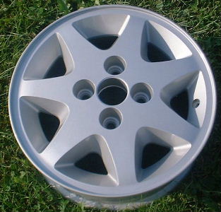 92-93 FORD TEMPO 14x6 Flat Tapered 7 Spoke A SILVER