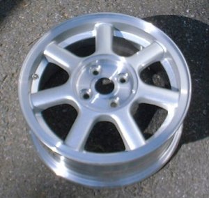 94-00 FORD ESCORT 15x5.5 Soft 7 Spoke w Covered Lugs A SILVER
