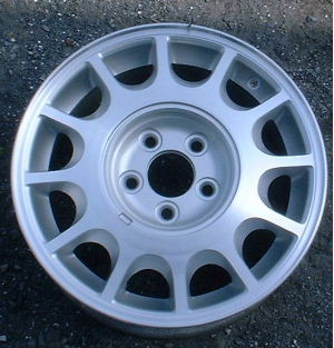 94-95 MERCURY SABLE 15x6 12 Slot with Covered Lugs MACHINE/SILVER