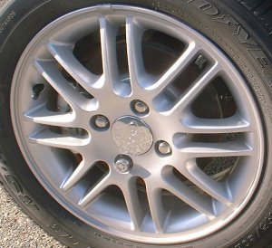 00-09 FORD FOCUS SE/SES/ZX3/ZX4/ZTS 15x6 Paired Thin 16 Spoke SILVER, LARGE CAP, NOTCH FOR CAP