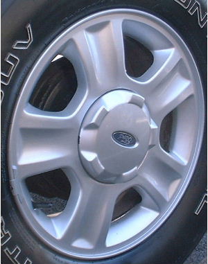 01-04 FORD ESCAPE XLT 16x7 Flat Indented 5 Spoke, Cvrd Lugs SILVER