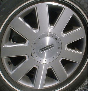 03-04 LINCOLN CONTINENTAL 17x7 Flat 9 Spoke w Covered Lugs MACHINE/SILVER
