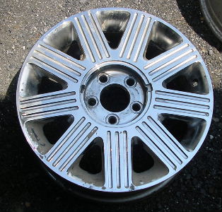 03-05 LINCOLN CONTINENTAL 17x7 Flat Triple Grooved 9 Spoke B CHROME - TEXTURED