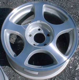 03-04 FORD MUSTANG 16x7.5 Flat 5 Spk w Covered Lugs A MACH/SILVER, LEDGE SLOT