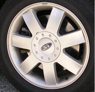 05-06 FORD 500 SE/SEL/LIMITED 17x7 7 Spoke w Round Center Cap SILVER