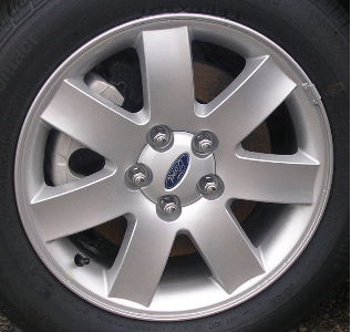 05-07 FORD 500 SE/SEL 17x7 7 Spoke with Exposed Lugs A SILVER