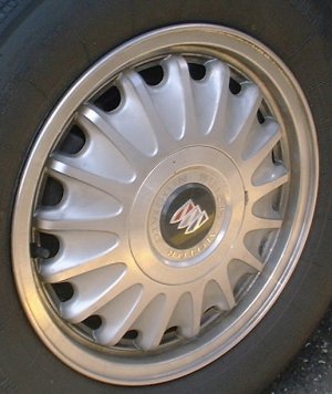 91-96 BUICK REGAL CUSTOM 15x6 17 Spoke with Covered Lugs A MACHINE/SILVER