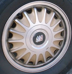 96 BUICK REGAL 15x6 17 Spoke with Covered Lugs B MACHINE/GOLD