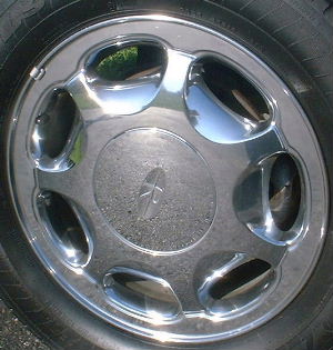 95-99 BUICK RIVIERA 16x6.5 7 Slot with Covered Lugs CHROME, OPT P05