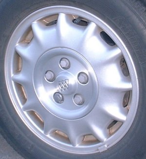 97 BUICK PARK AVENUE 16x6.5 12 Spoke with Covered Lugs SILVER, OPT N73