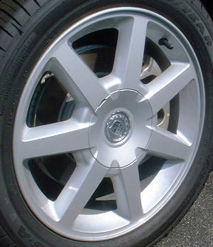 05 CADILLAC STS 17x8 Thin 7 Spoke w Covered Lugs SILVER, OPTION Q14