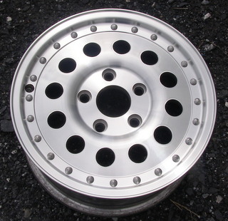 89-91 CHEVROLET S10 PICKUP 4X4 15x7 Contoured 12 Hole with Rivets A FLAT HUB, MACH'D