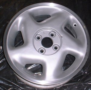 91-93 GEO STORM 15x6 Soft 5 Spoke with Covered Lugs LEFT SILVER