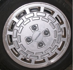 85-86 NISSAN MAXIMA 15x6 Indented Slotted 12 Slot B SILVER