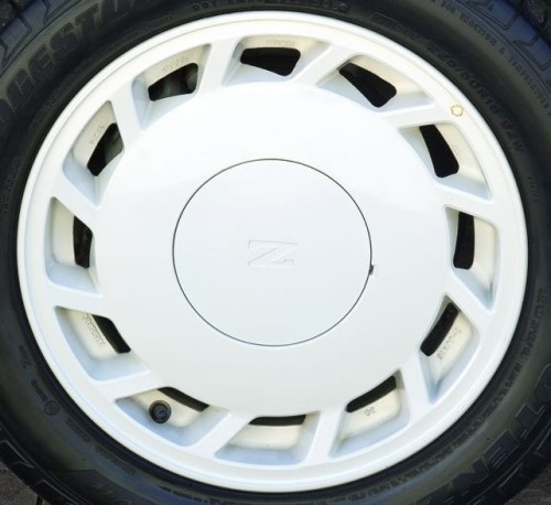 88-89 NISSAN 300ZX 15x6.5 Slanted 12 Slot with Covered Lugs WHITE