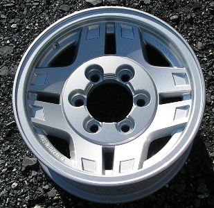 91-92 TOYOTA LAND CRUISER 15x7 Dished Notched Dbl 4 Cross SILVER